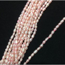 Perla ovalada color rosada, 2mm