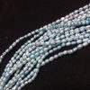 Perla ovalada color azul, 2mm