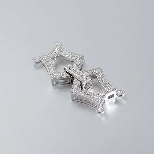 BROCHE FORMA HEBILLA 2 VUELTAS CON CIRCÓN