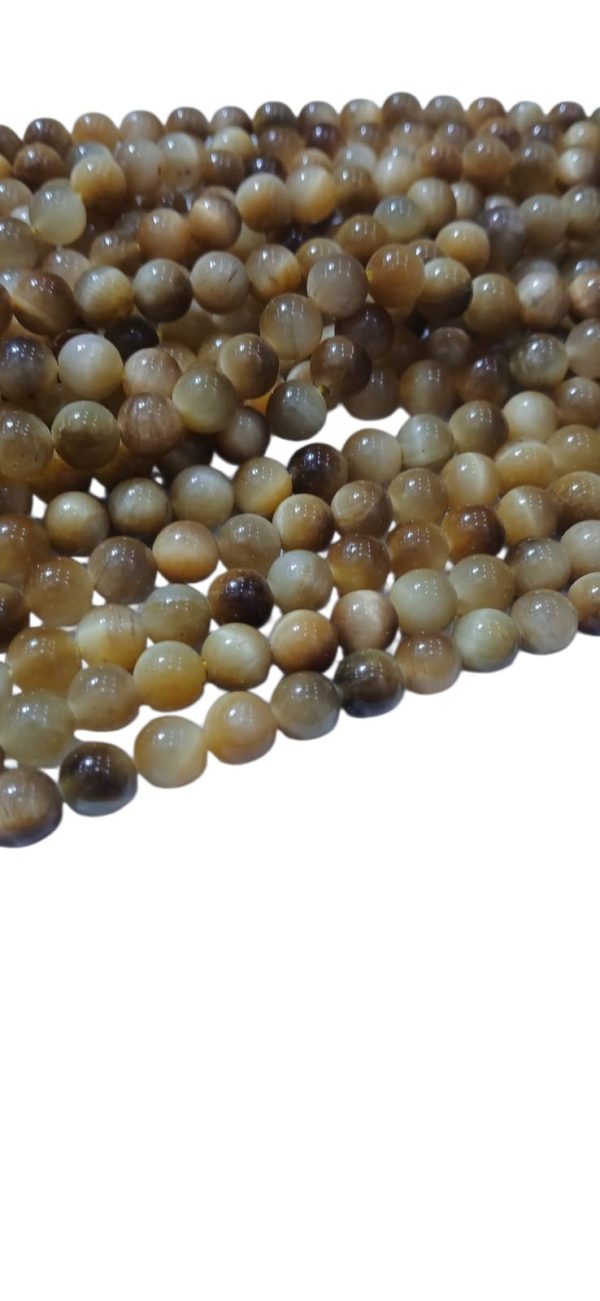 OJO DE TIGRE DORADO