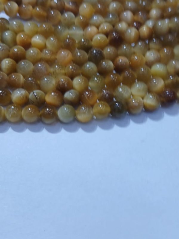 OJO DE TIGRE DORADO
